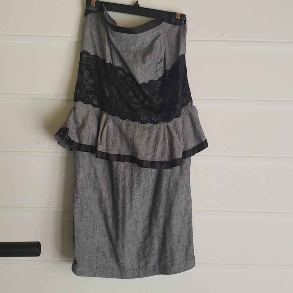 Super cute peplum Grey with Black lace on front of Dress.